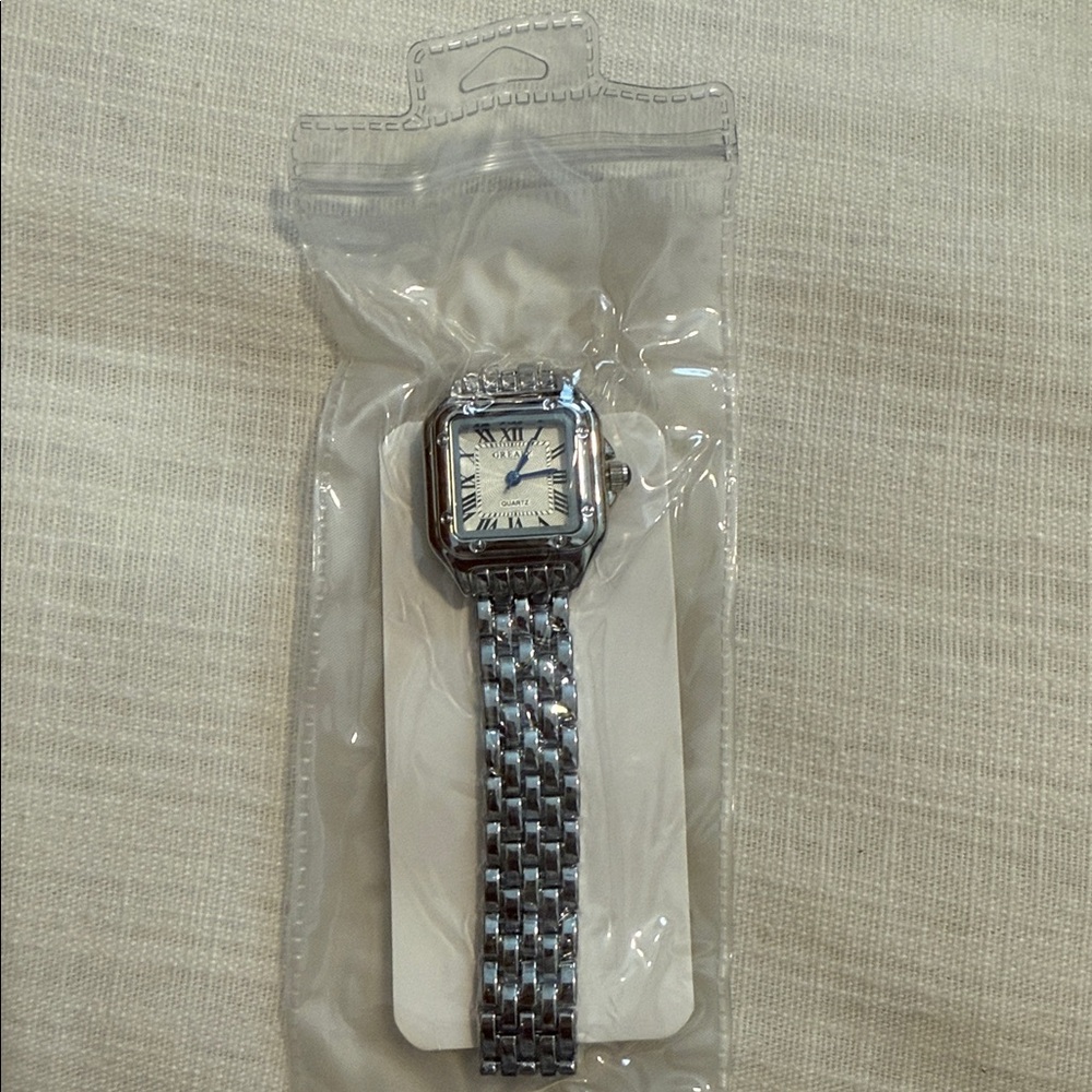 Panthere Classic Rectangle Stainless Steel
Gold Watch - Picture 14 of 16